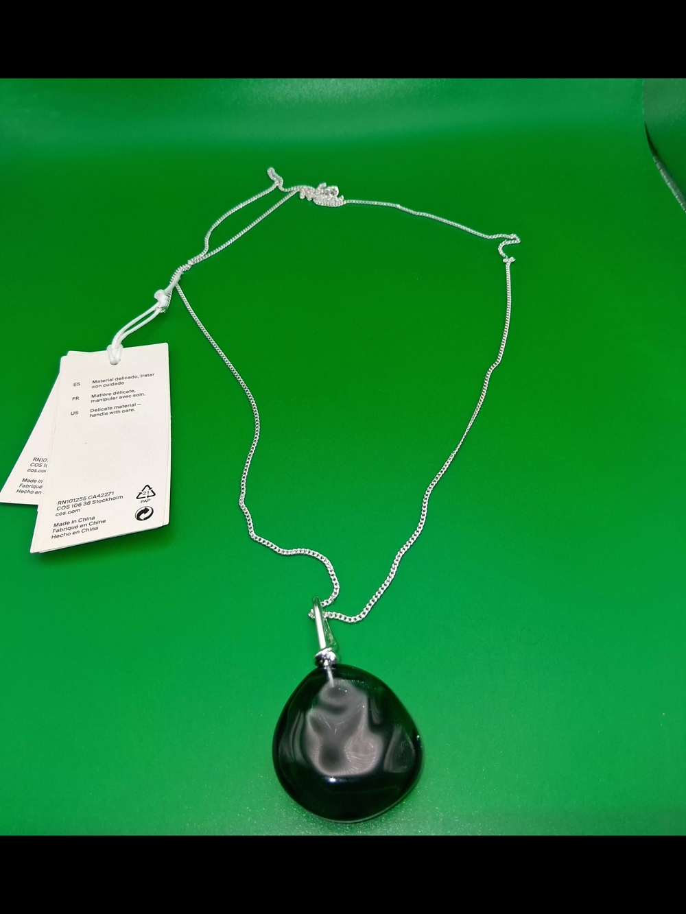 COS White Garment Care Tag